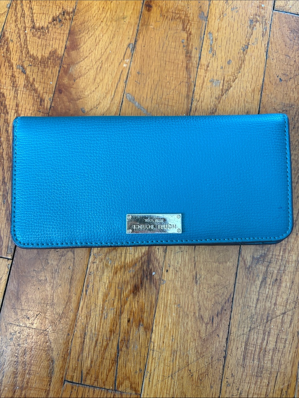 Henri Bendel teal pebbled leather zip continental wallet with gold logo